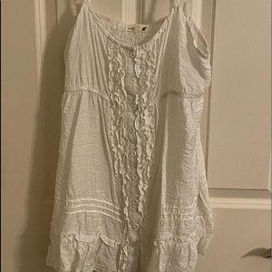 Vintage white tank top with ruffle details.